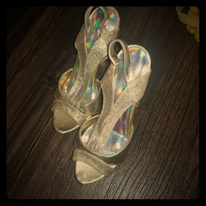 Gold sparkly high heels